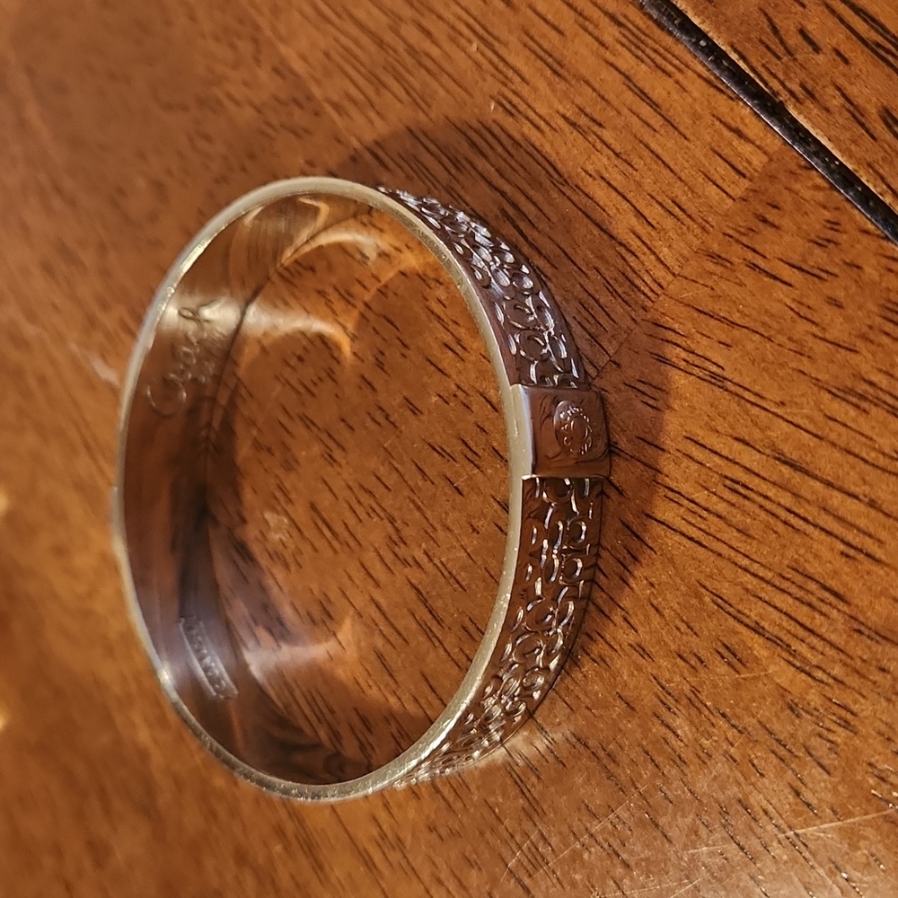 Silver Coach Bangle Bracelet  Circumfrence: 2 inches